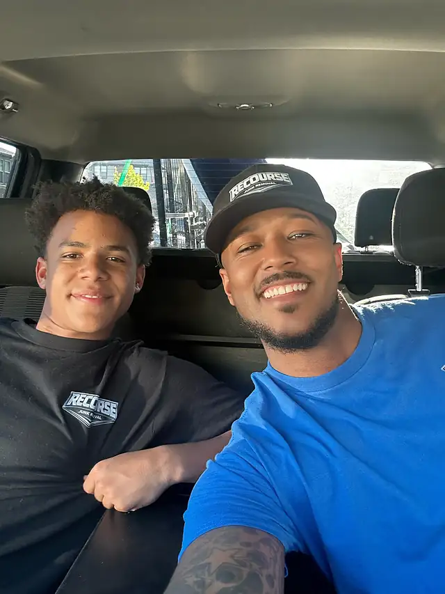 Recourse Junk Removal father-and-son owners in their truck