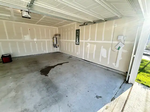 The same garage empty after cleanout