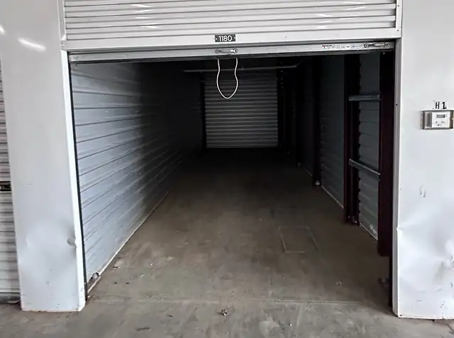 The same storage unit empty and swept after cleanout