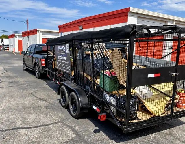 Recourse trailer loaded with junk and debris at a storage facility